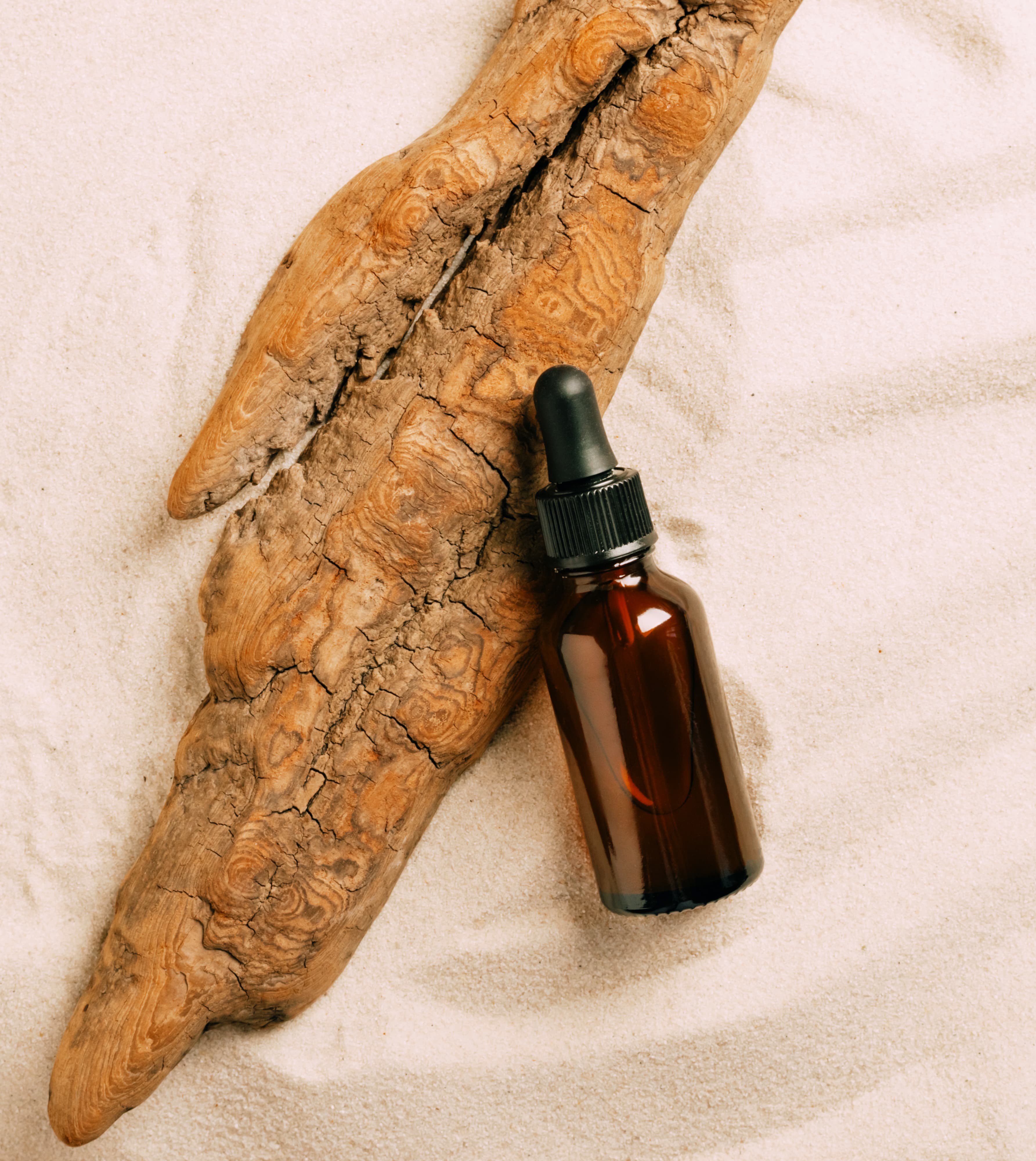 Amber Aeromm bottle on soft linen